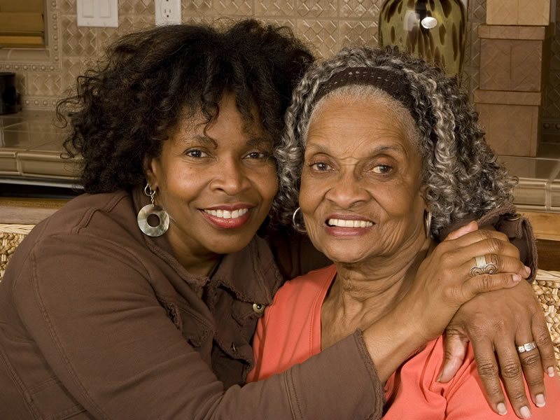 Mother and daughter embracing